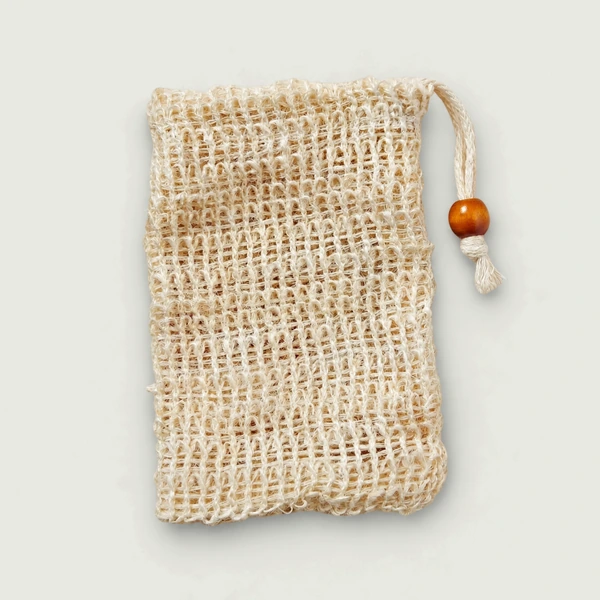 Natural sisal soap saver bag with drawstring and wooden bead.